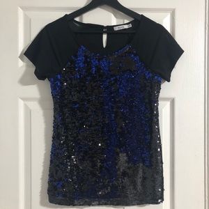 Reversible two tone sequence top with mesh sleeve